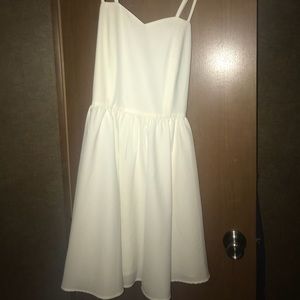 Classy white dress with strappy blue back